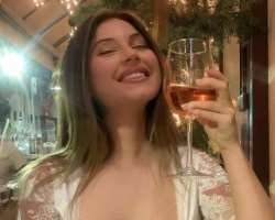Sophia Kleo consuming alcohol